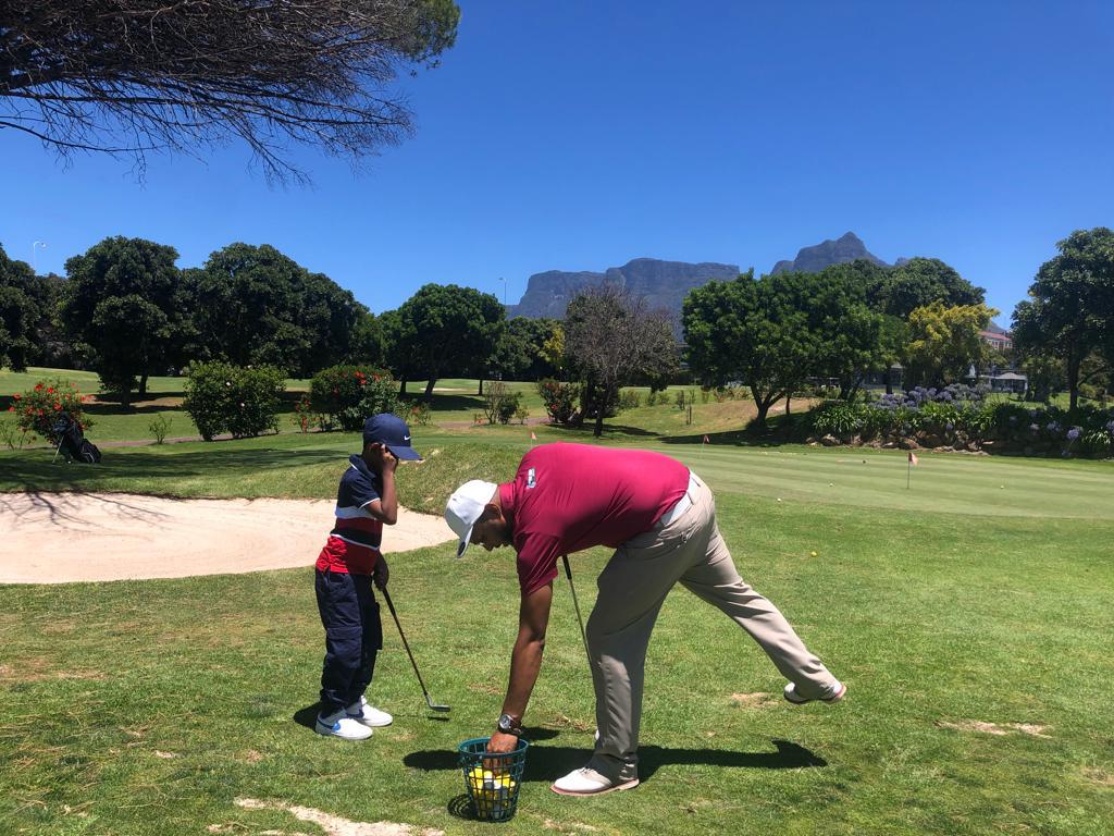 On the course with Table Mountain behind